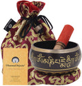 Tibetan singing bowl with mallet and cushion
