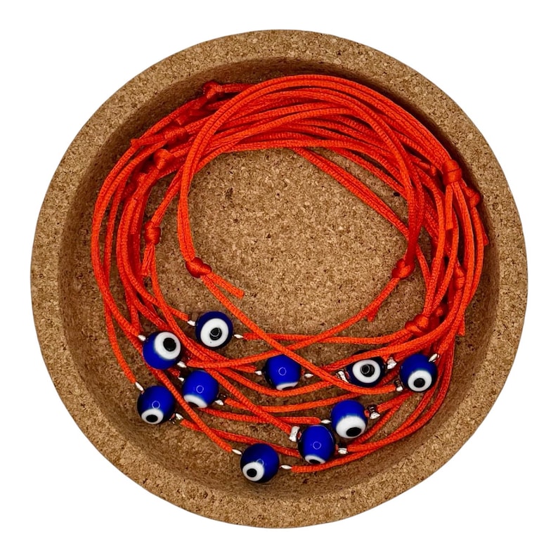 Evil eye nazar bead bracelet on red cord